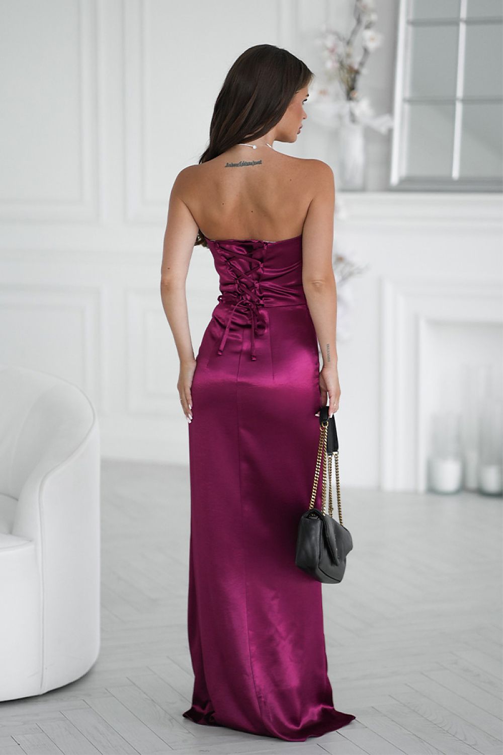 Back view of Bicotone fuchsia satin long dress with lace-up corset back
