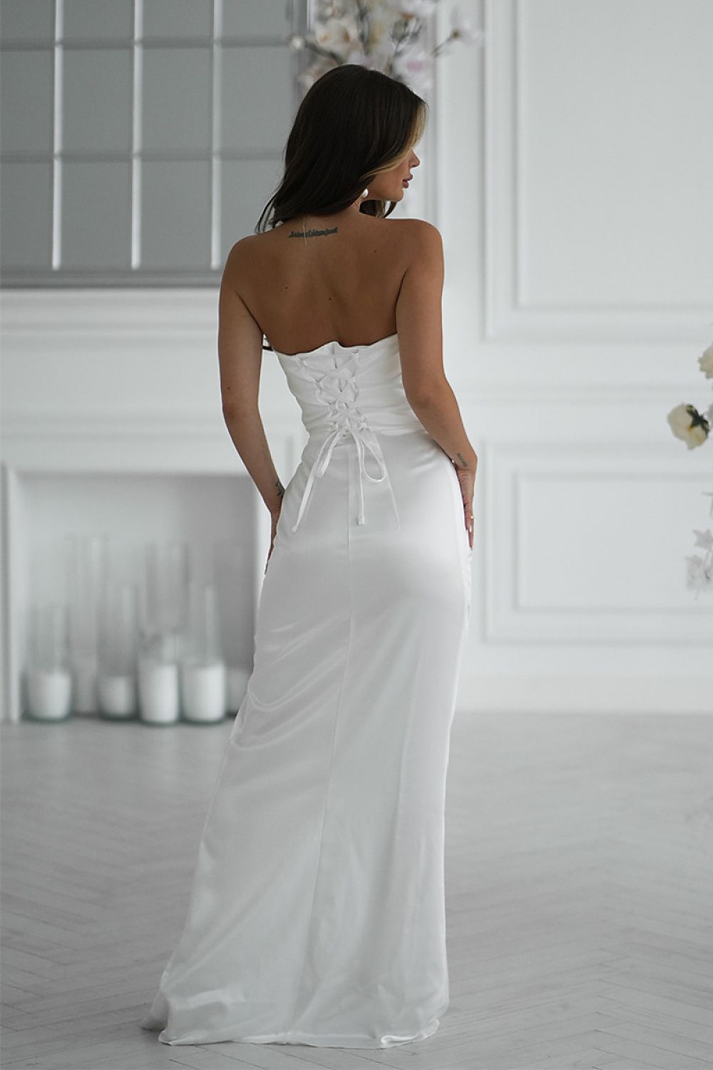 Back view of Bicotone white satin long dress with corset lace-up back